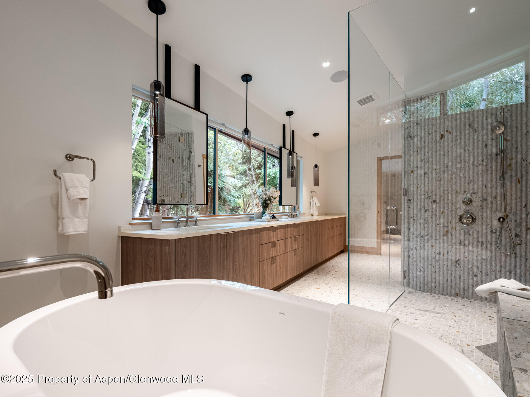 51 Roaring Fork Drive Aspen, CO 81611 - Photo 20 of 30 a bathroom with a tub sink and mirror