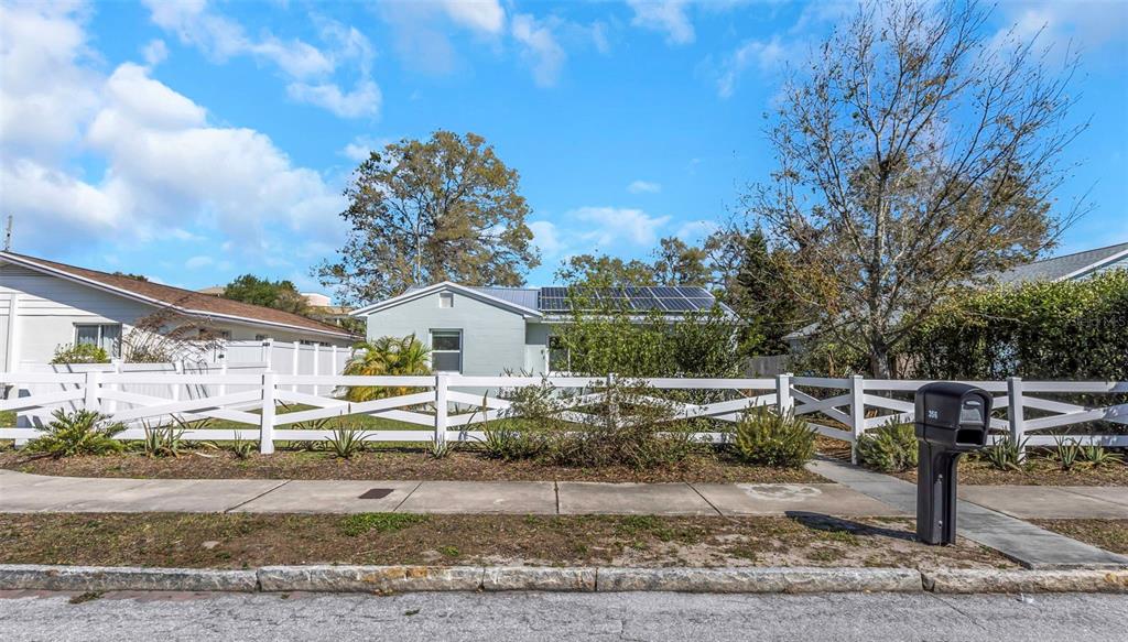 356 Ridge Road Southwest Largo, FL 33770 - Photo 27 of 30 Front of house with street parking