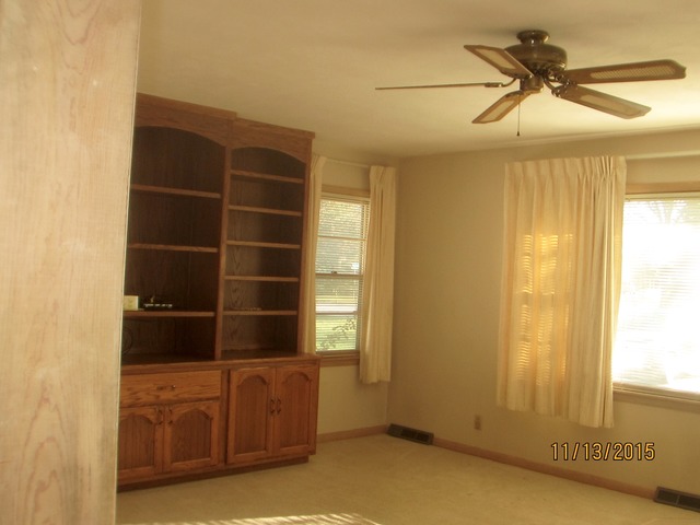 2223 Garden Road Aurora, IL 60506 - Photo 3 of 12 a view of an empty room with a window