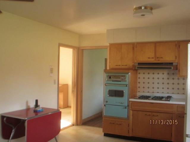 2223 Garden Road Aurora, IL 60506 - Photo 6 of 12 a kitchen with stainless steel appliances granite countertop a stove and a microwave