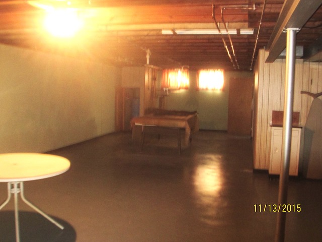 2223 Garden Road Aurora, IL 60506 - Photo 9 of 12 a view of a room with wooden floor and a chair