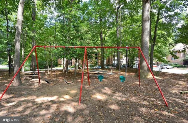 a view of a park with sitting area