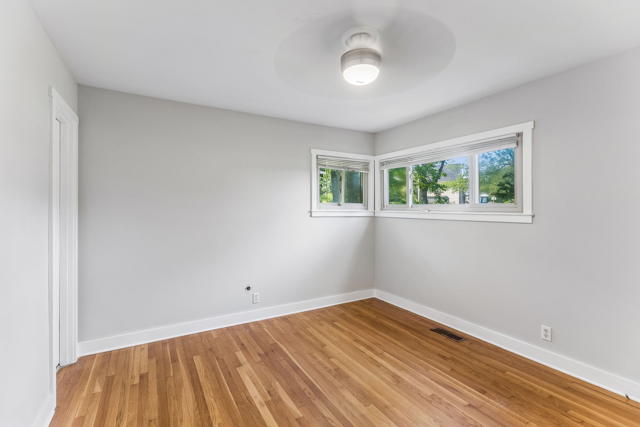 4425 Prescott Road Nashville, TN 37204 - Photo 11 of 36 a view of empty room with wooden floor and fan