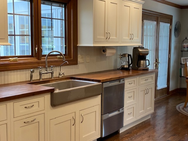 6-n143 Woodland Road St. Charles, IL 60175 - Photo 4 of 17 a kitchen with stainless steel appliances granite countertop a sink and a white cabinets