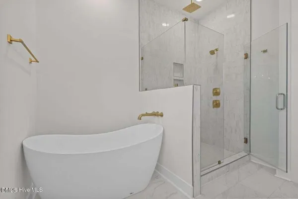 a bathroom with 2 sink and a mirror