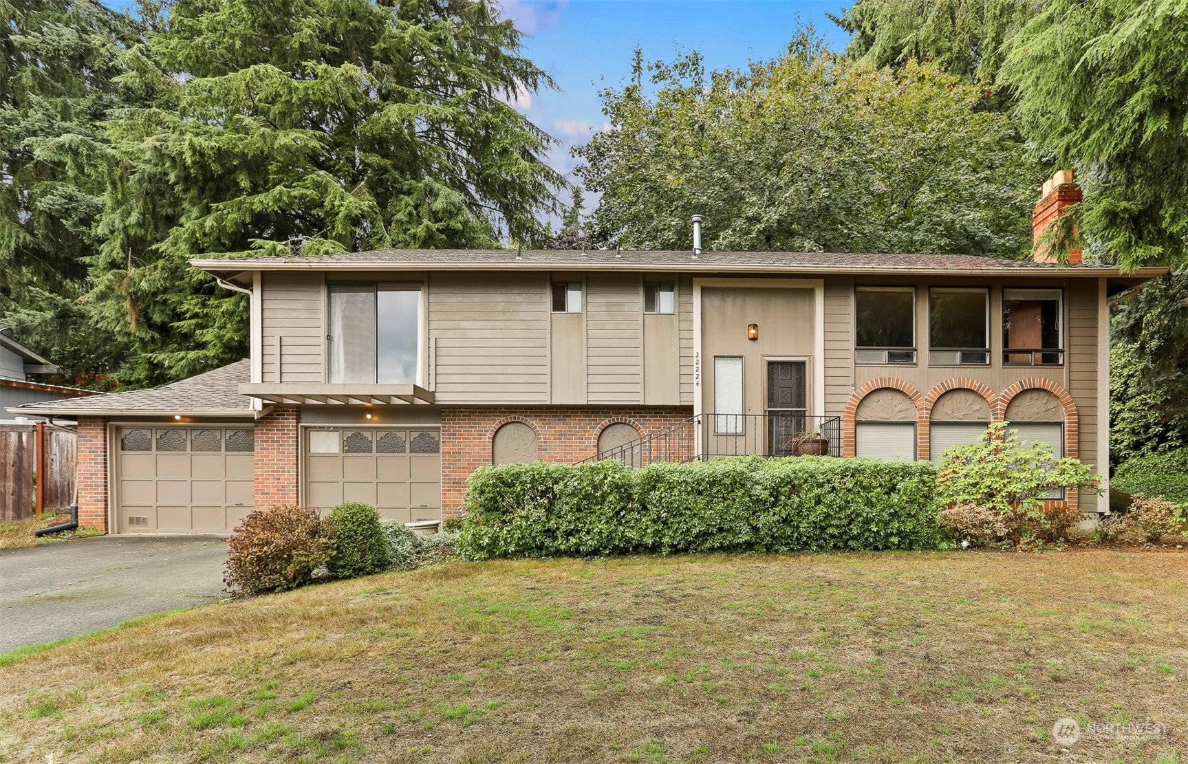 22224 4th Avenue Southeast Bothell, WA 98021 - Photo 1 of 23 a front view of a house with garden
