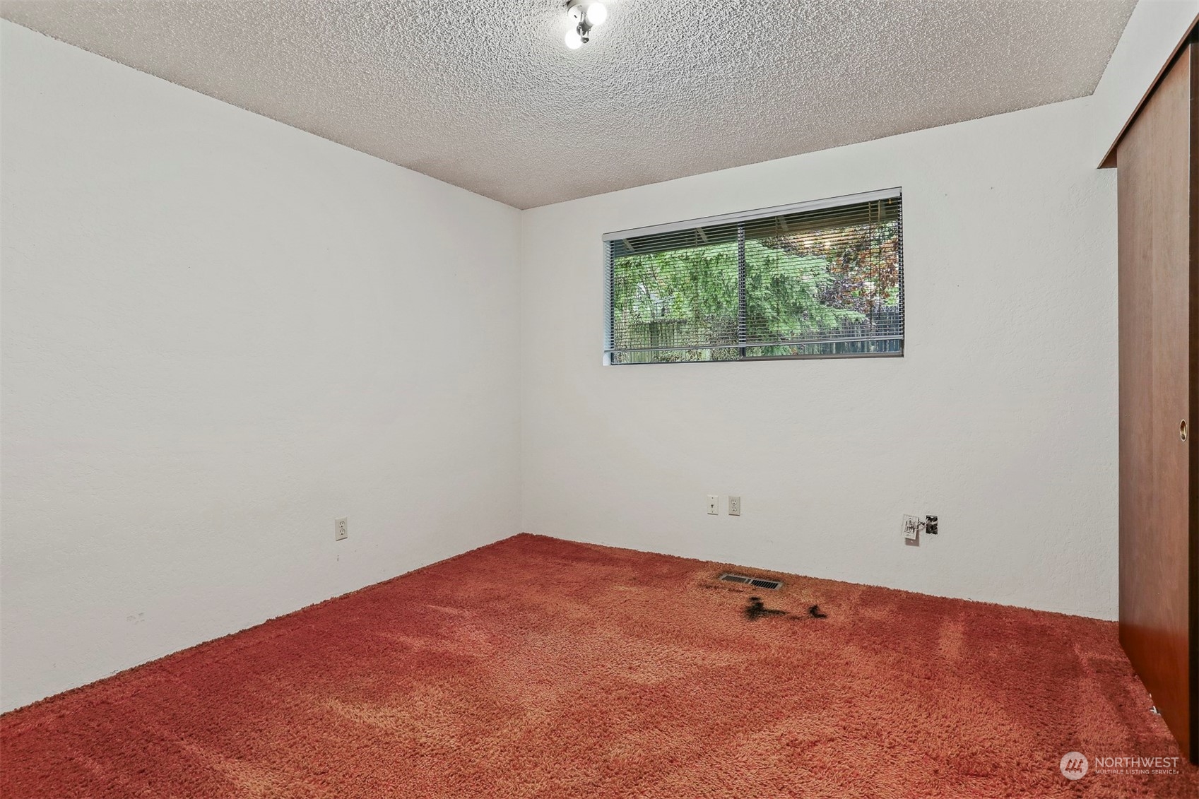 22224 4th Avenue Southeast Bothell, WA 98021 - Photo 11 of 23 an empty room with a window