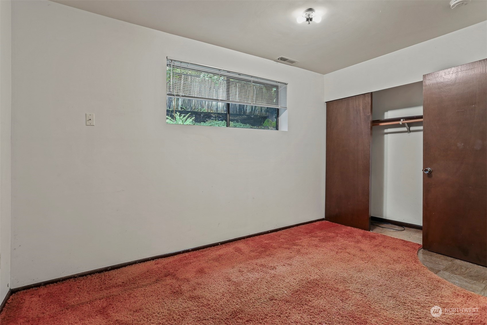22224 4th Avenue Southeast Bothell, WA 98021 - Photo 12 of 23 an empty room with windows and refrigerator