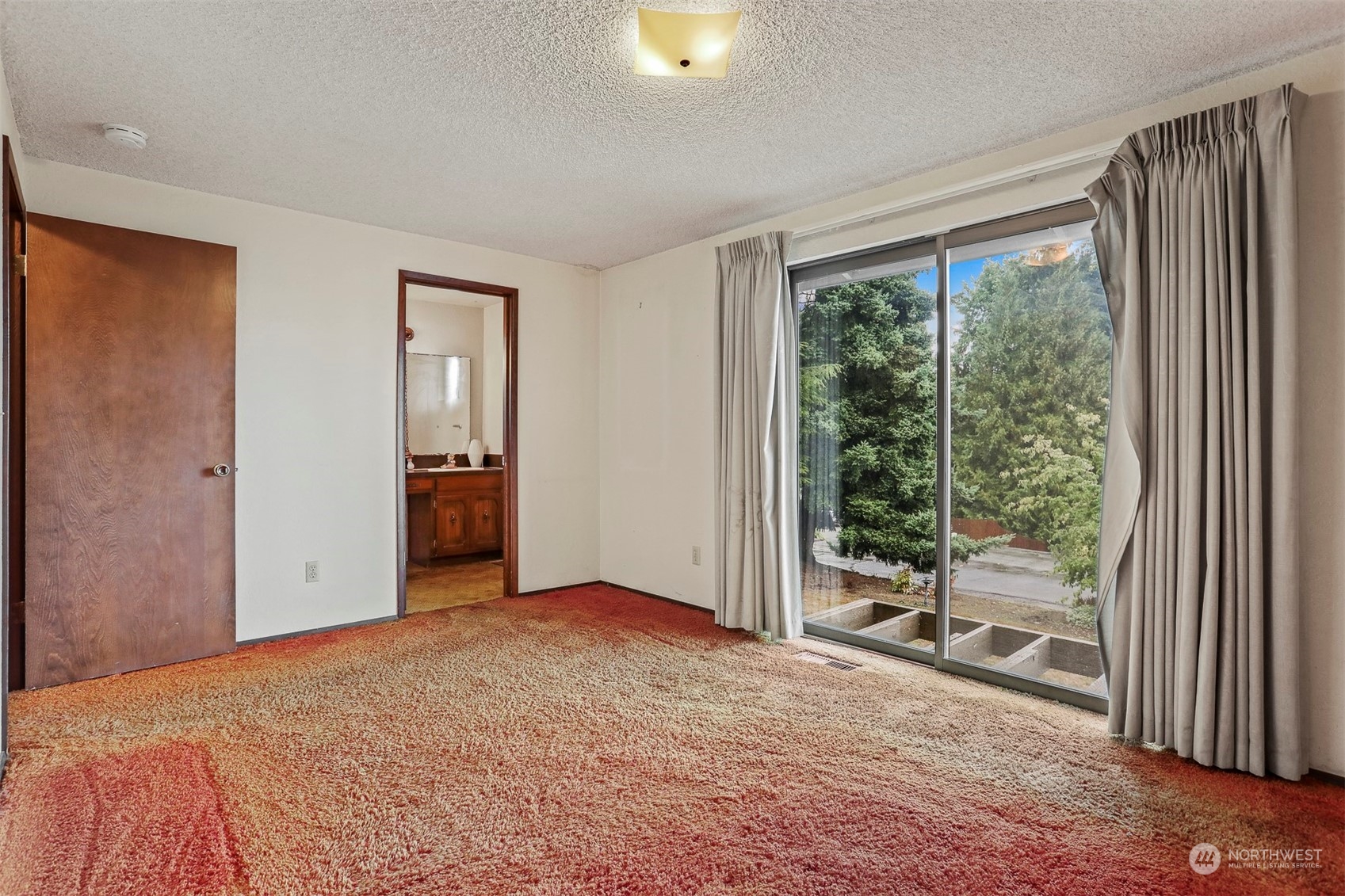 22224 4th Avenue Southeast Bothell, WA 98021 - Photo 8 of 23 a view of an empty room with a balcony and chair