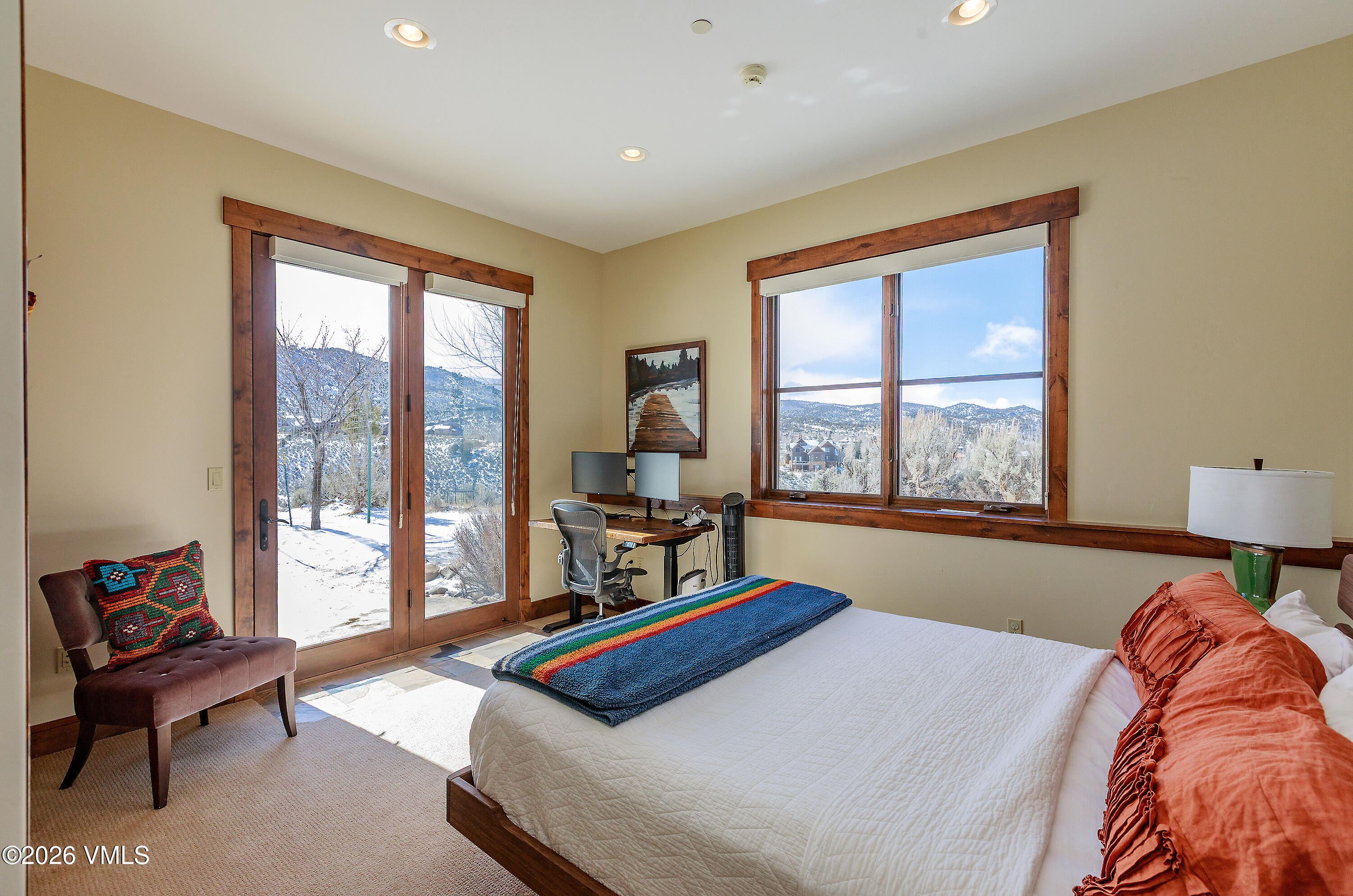 2753 East Haystacker Drive Eagle, CO 81631 - Photo 32 of 41 a bedroom with furniture and a large window
