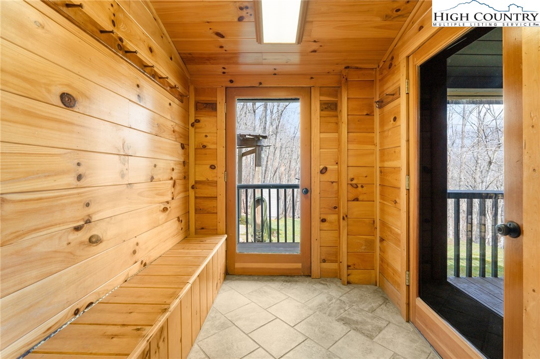 1748 Junaluska Road Boone, NC 28607 - Photo 25 of 37 a view of a brick house with a outdoor space