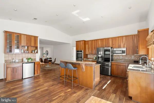 a view of a livingroom with furniture and window