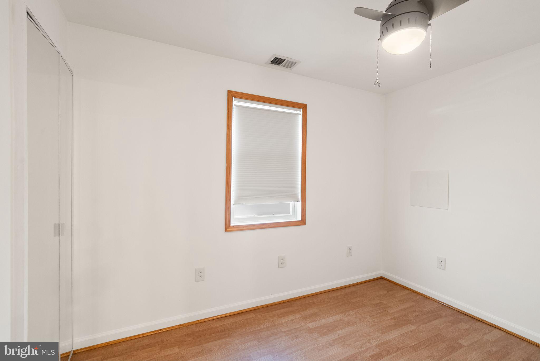 8737 Redman Street Springfield, VA 22153 - Photo 33 of 62 an empty room with a window