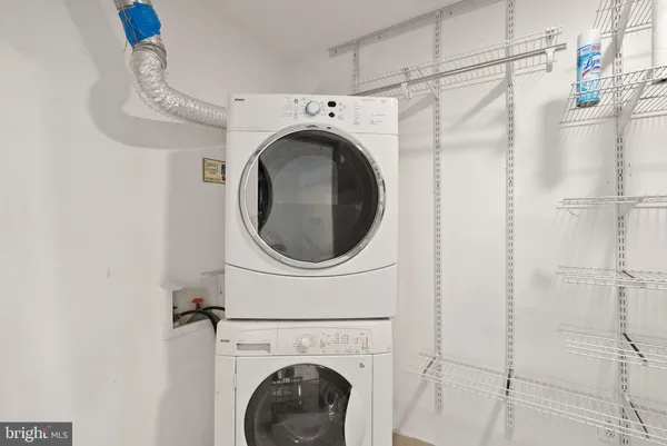 a bathroom with a toilet sink and shower