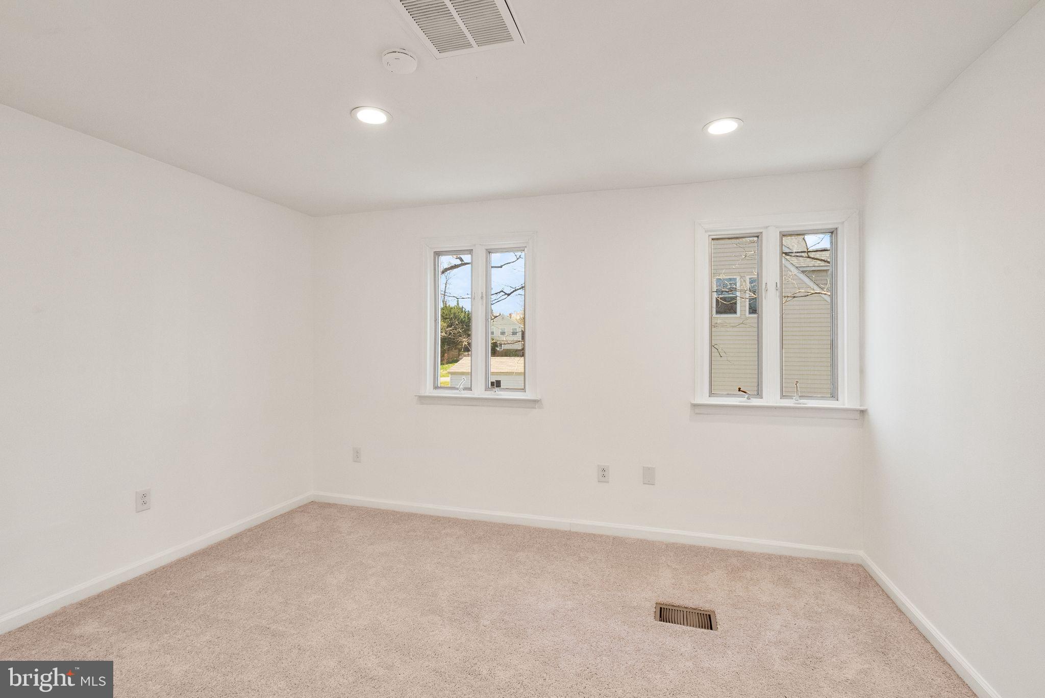 8737 Redman Street Springfield, VA 22153 - Photo 46 of 62 an empty room with windows