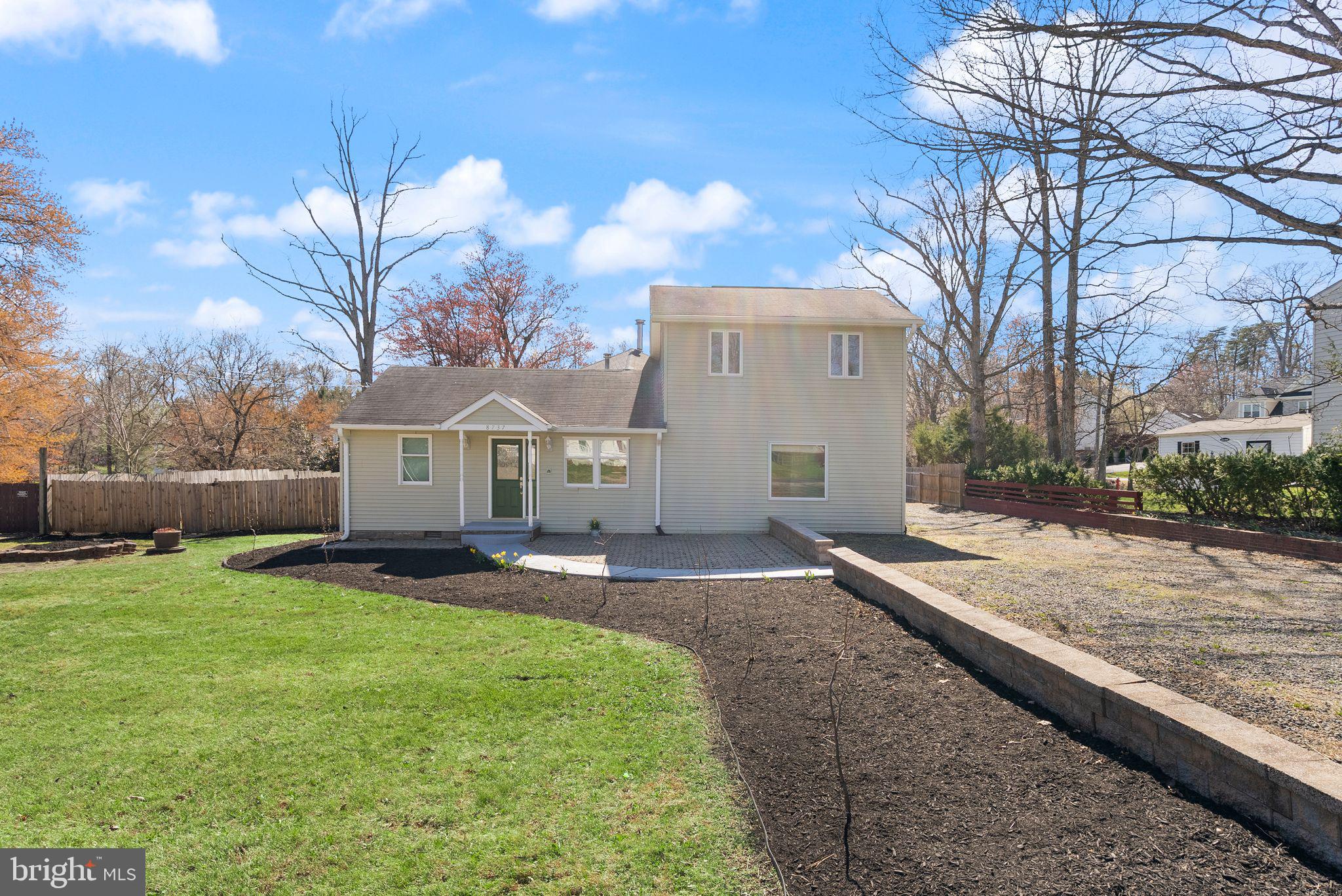 8737 Redman Street Springfield, VA 22153 - Photo 57 of 62 a view of a house with a yard