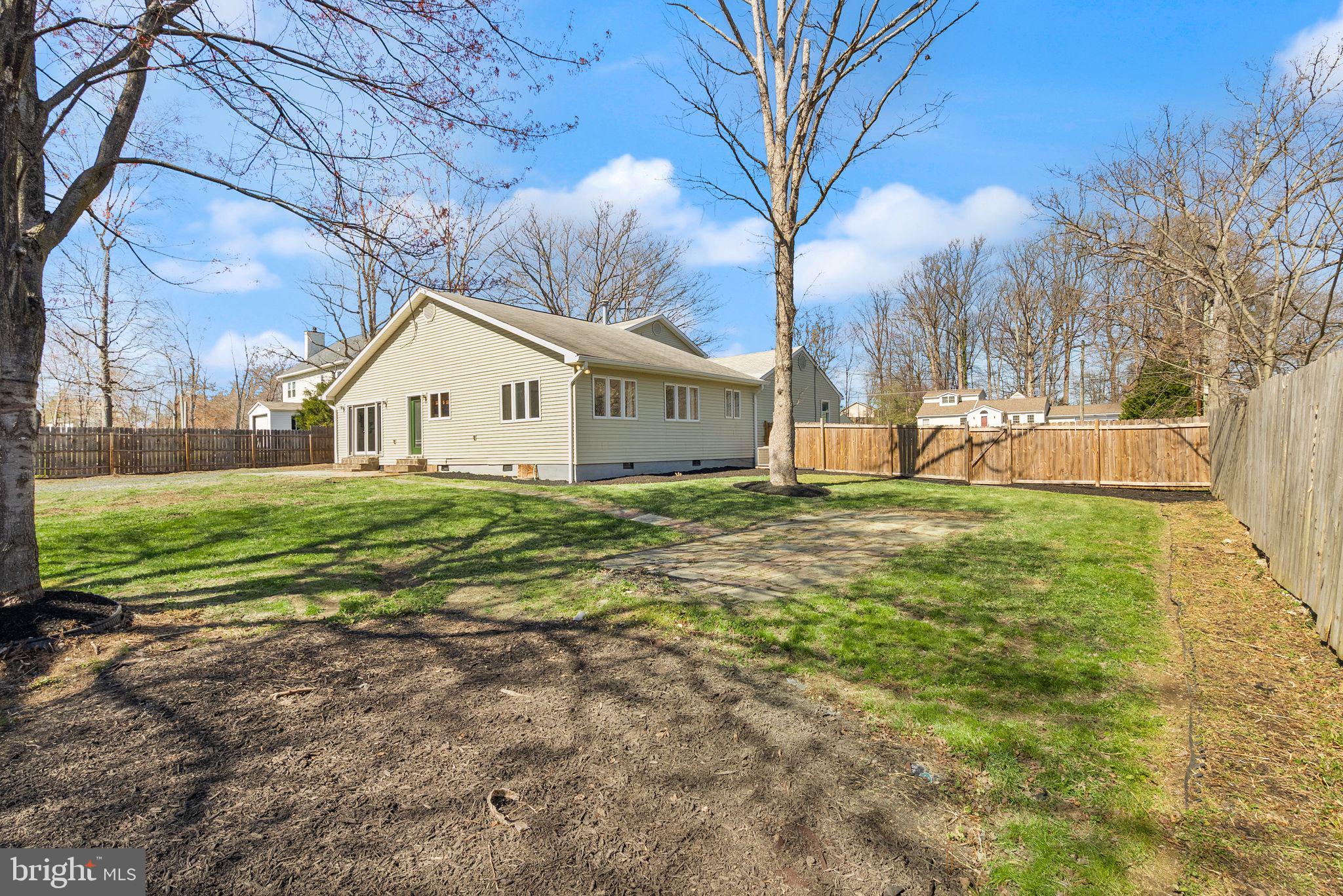 8737 Redman Street Springfield, VA 22153 - Photo 61 of 62 a view of a house with a yard