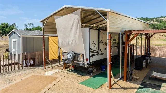 a patio view with a table and chairs