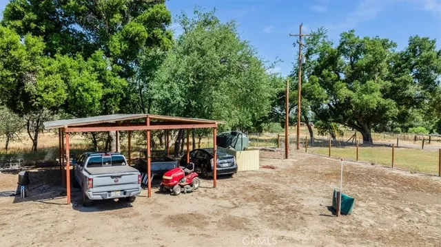 a view of a cars parked in a parking space