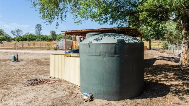 a view of a street with a building in the background