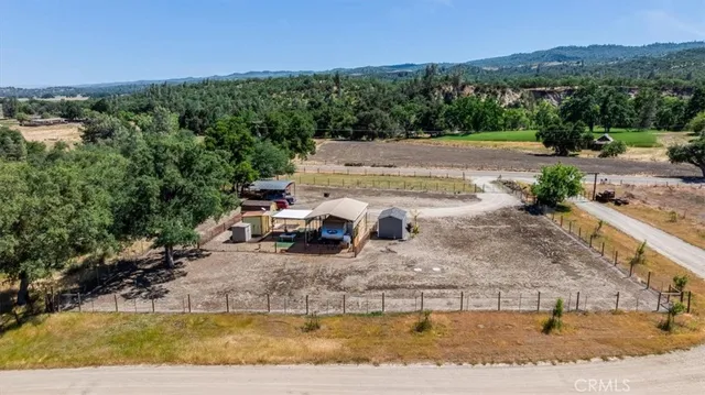 a view of a swimming pool with an outdoor seating