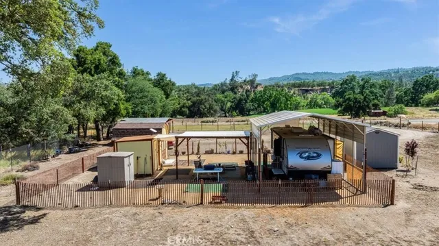 a view of a patio with wooden floor