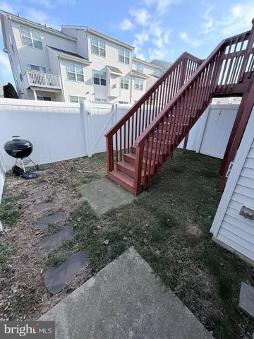 a view of a back yard of the house