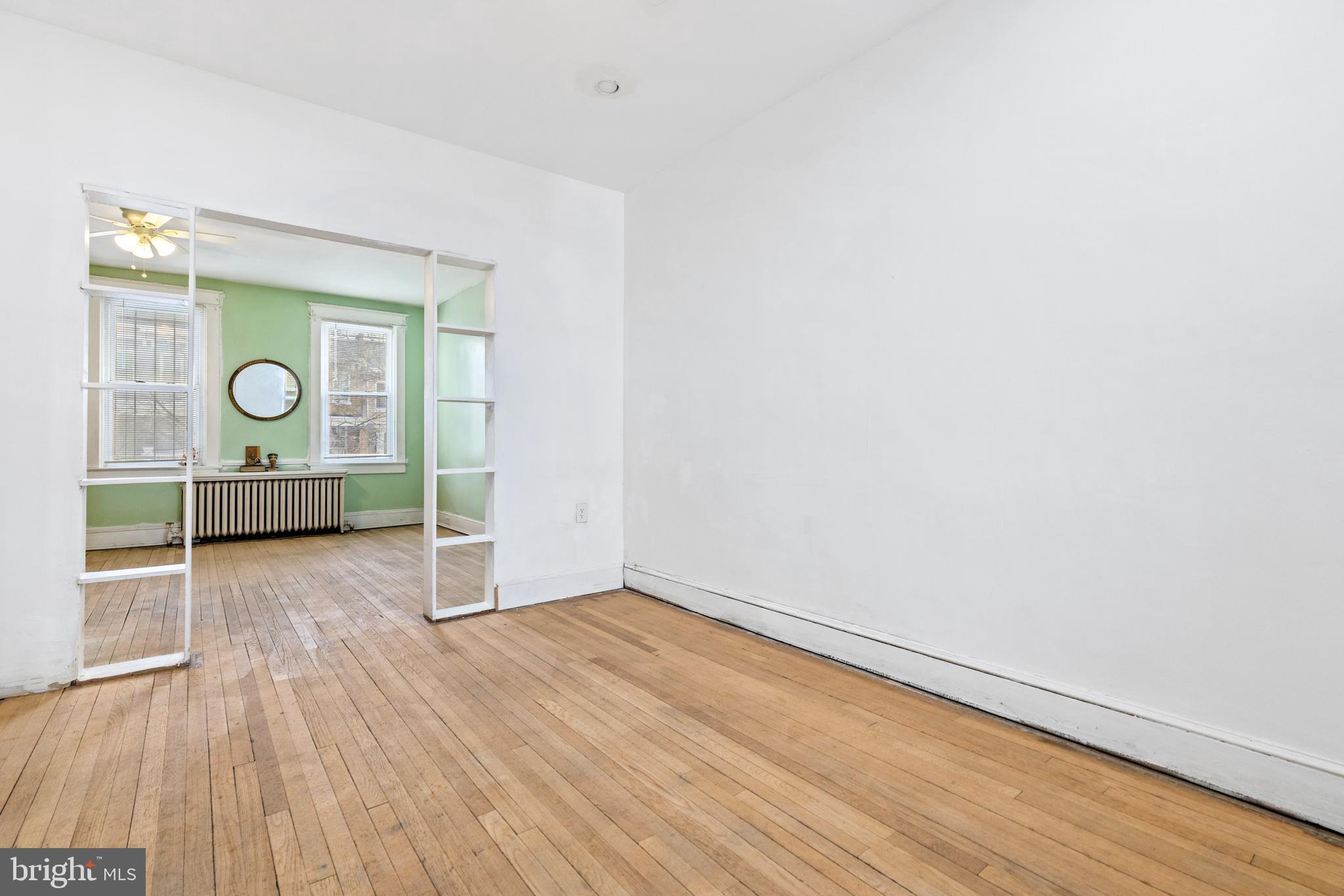 5506 8th Street Northwest Washington, DC 20011 - Photo 11 of 26 a view of empty room with wooden floor