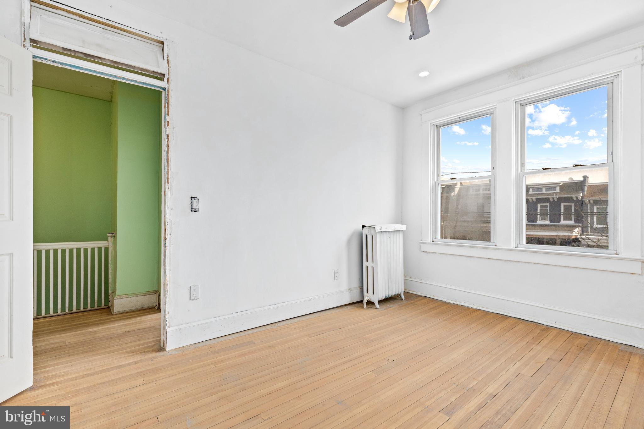 5506 8th Street Northwest Washington, DC 20011 - Photo 20 of 26 a view of an empty room with a window