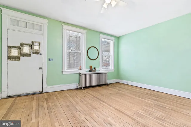 a living room with a wooden floor