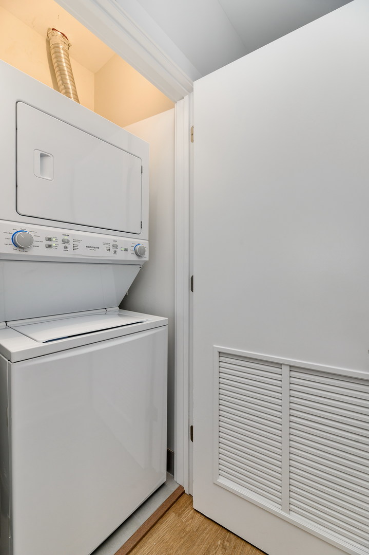1807 West Division Street, Unit 301 Chicago, IL 60622 - Photo 13 of 15 a utility room with dryer and washer