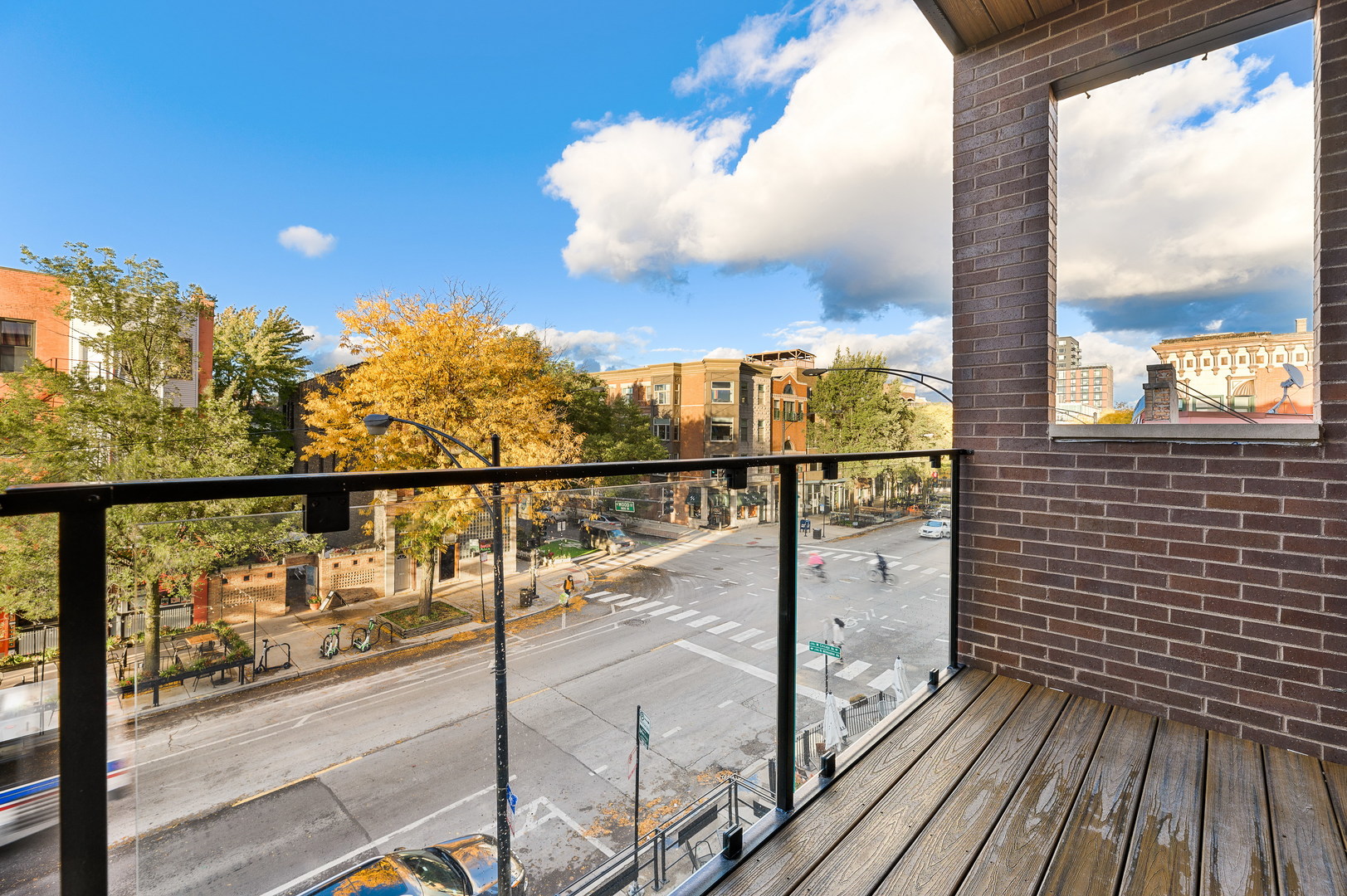 1807 West Division Street, Unit 301 Chicago, IL 60622 - Photo 14 of 15 a view of a balcony with wooden floor
