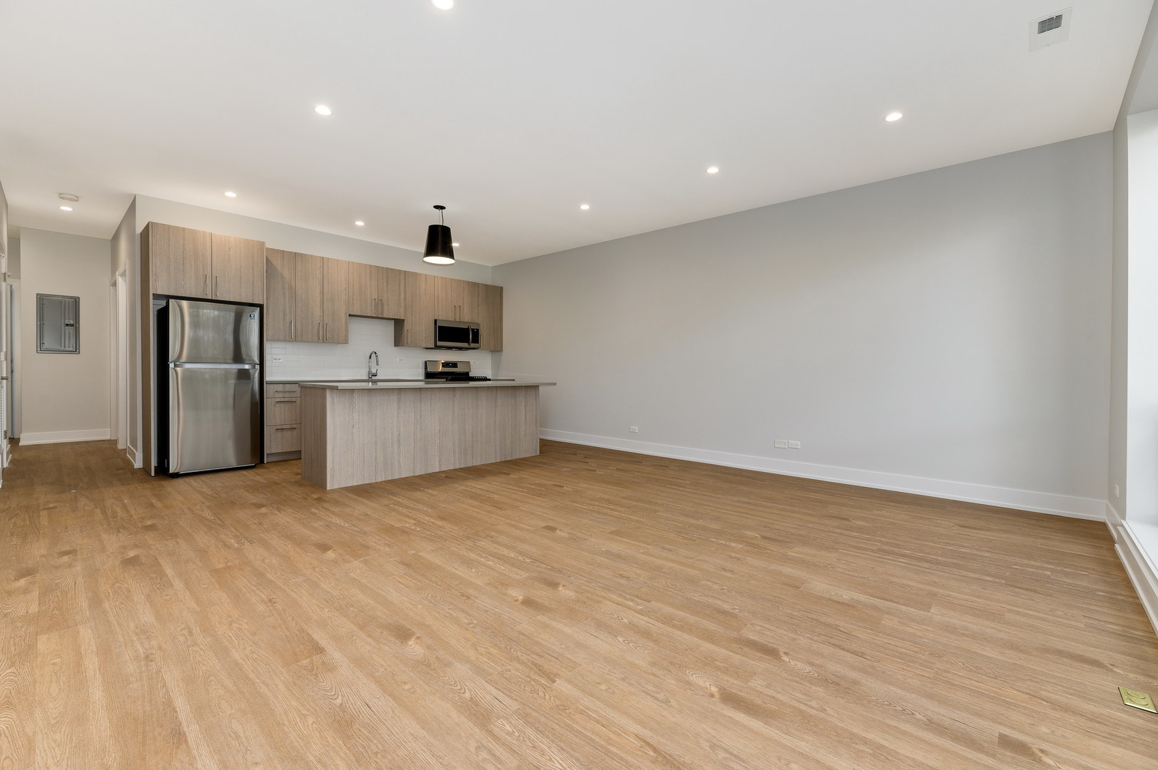 1807 West Division Street, Unit 301 Chicago, IL 60622 - Photo 6 of 15 a view of kitchen and refrigerator