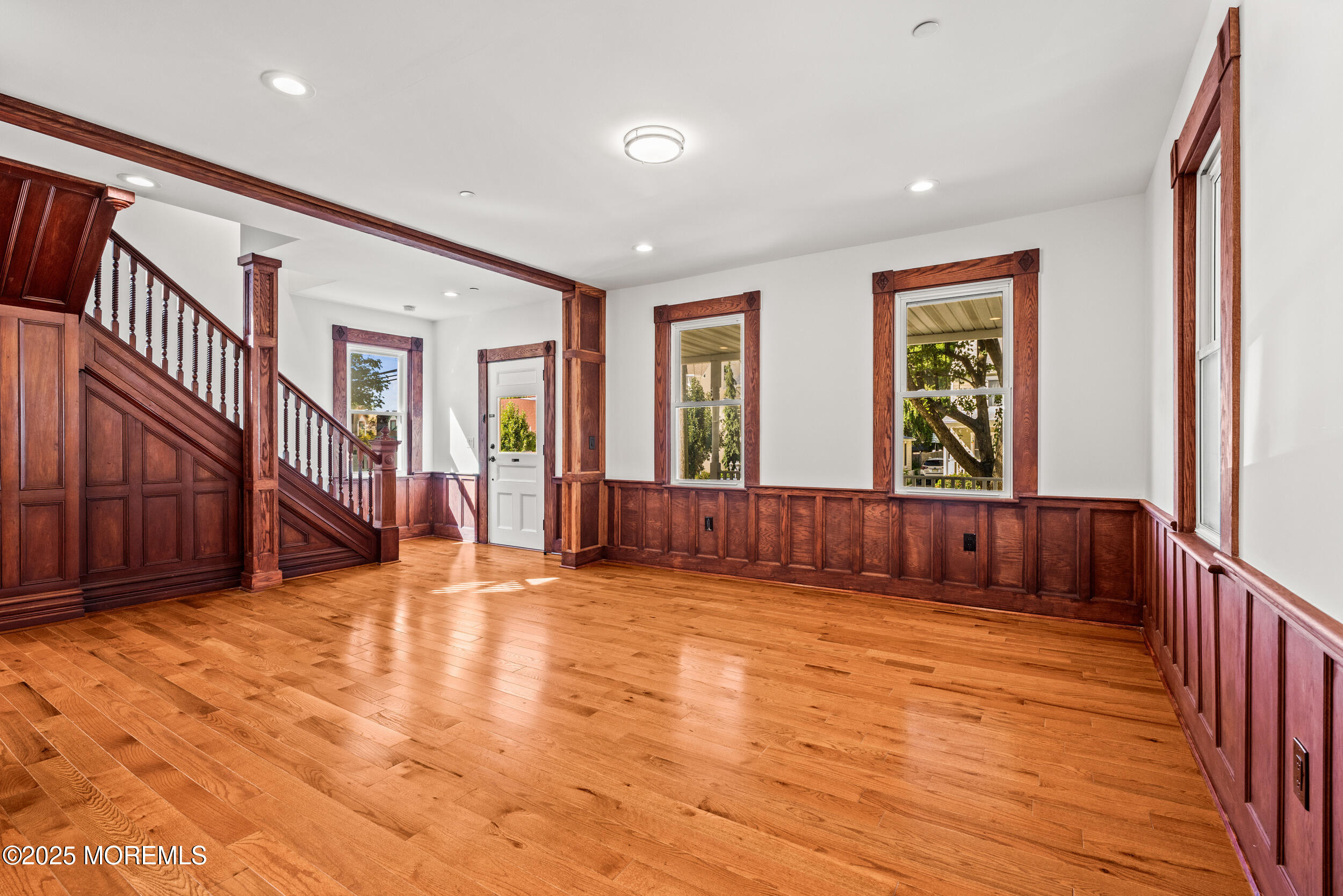 73 3rd Avenue, Unit C Atlantic Highlands, NJ 07716 - Photo 6 of 21 a view of an entryway with wooden floor and door