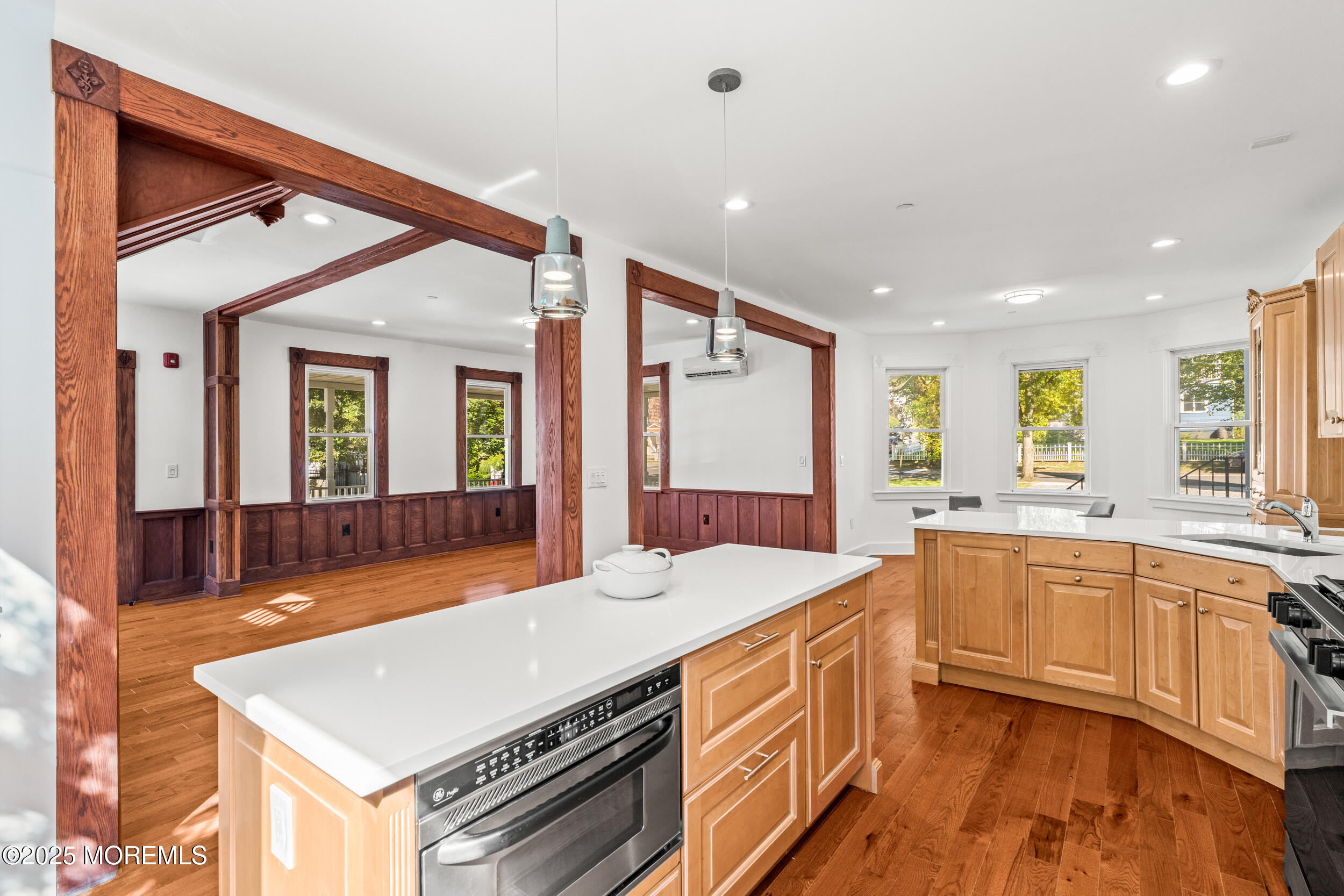 73 3rd Avenue, Unit C Atlantic Highlands, NJ 07716 - Photo 7 of 21 a large kitchen with kitchen island a sink stainless steel appliances and cabinets