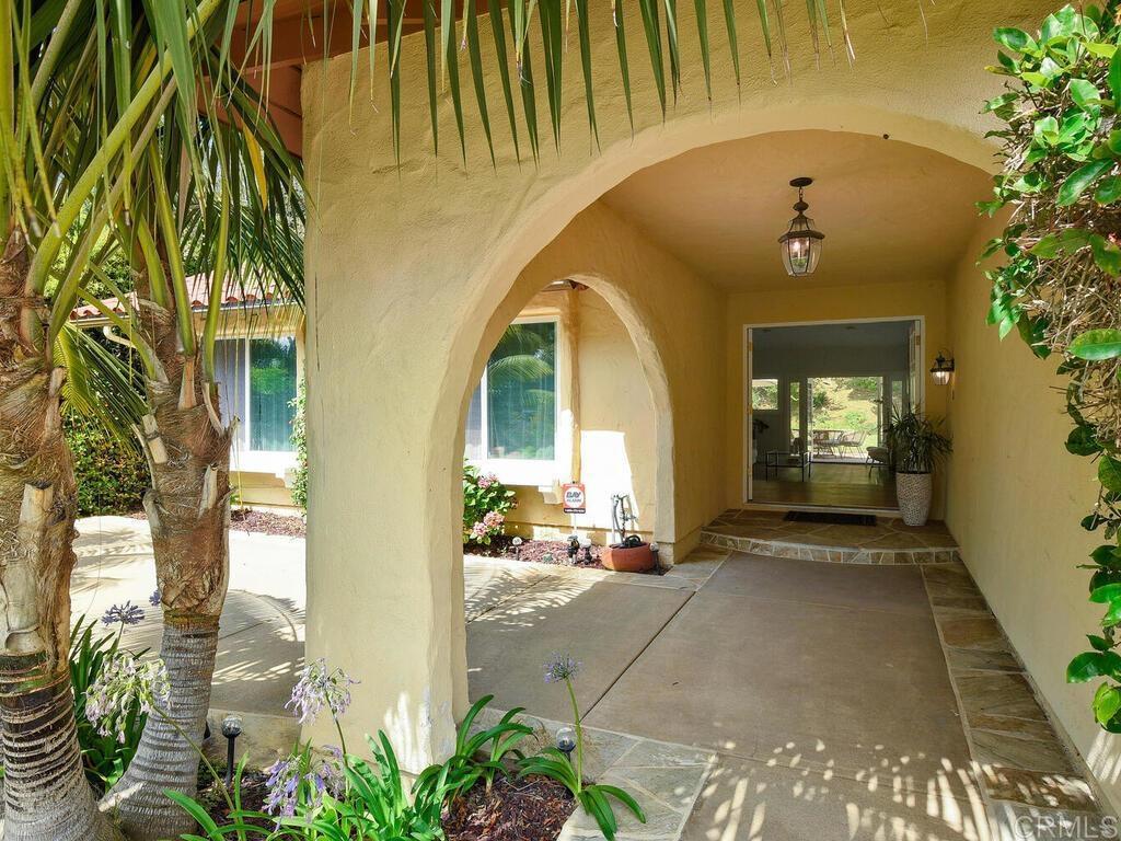 14146 Mango Drive Del Mar, CA 92014 - Photo 2 of 33 a view of entrance gate of the house