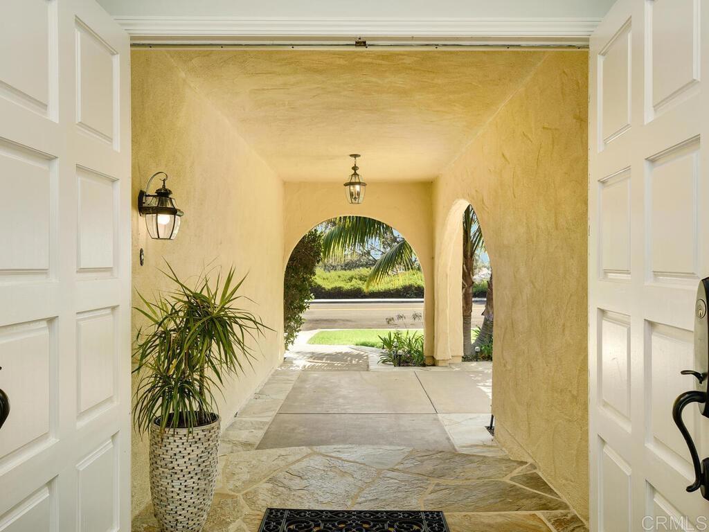 14146 Mango Drive Del Mar, CA 92014 - Photo 5 of 33 a bathroom with a sink and a mirror