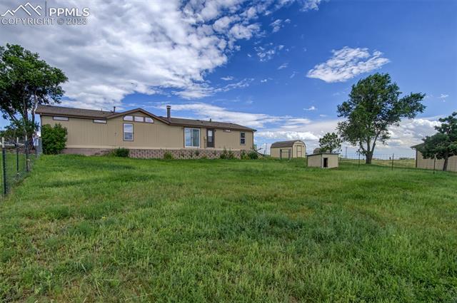 16215 Stage Stop Road Peyton, CO 80831 - Photo 21 of 33 Backyard with fenced area