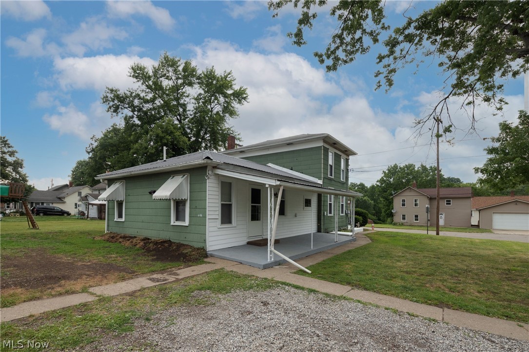 5117 Ridge Avenue Southeast Canton, OH 44707 - Photo 20 of 24 The metal portion of the roof is new!