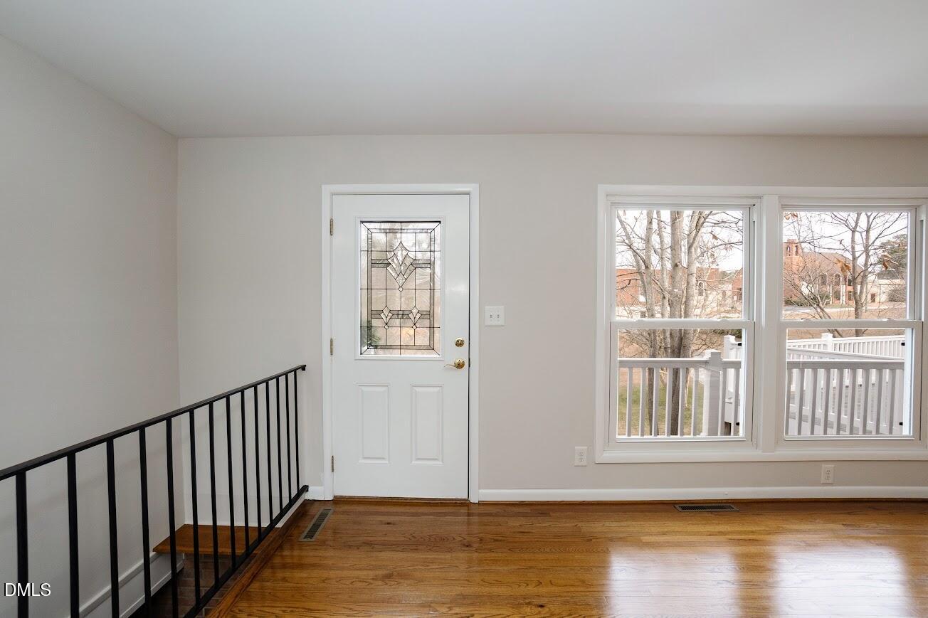 4000 Donna Road Raleigh, NC 27604 - Photo 16 of 58 a view of a livingroom with wooden floor