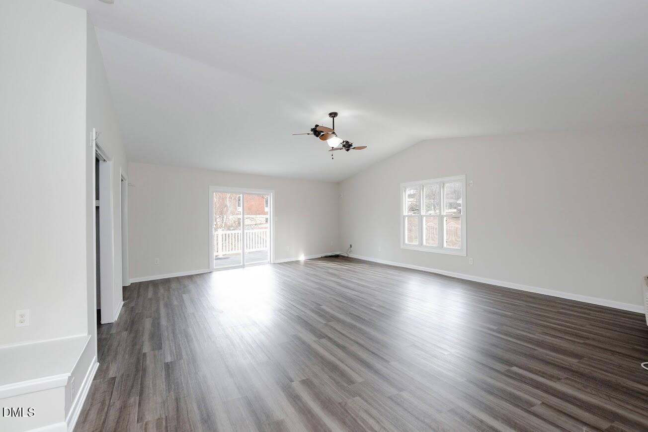 4000 Donna Road Raleigh, NC 27604 - Photo 29 of 58 an empty room with wooden floor and windows