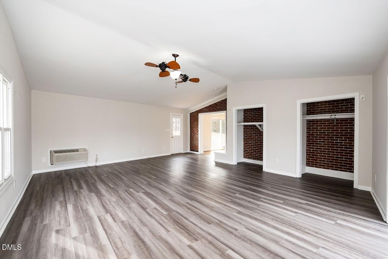 4000 Donna Road Raleigh, NC 27604 - Photo 30 of 58 wooden floor in an empty room with a window