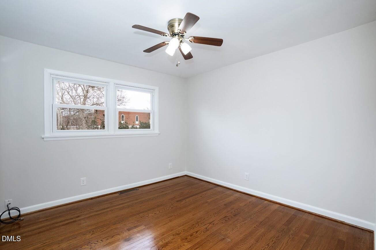 4000 Donna Road Raleigh, NC 27604 - Photo 32 of 58 a view of a big room with wooden floor and windows