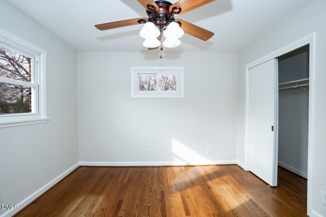 4000 Donna Road Raleigh, NC 27604 - Photo 36 of 58 a view of an empty room with wooden floor and a window