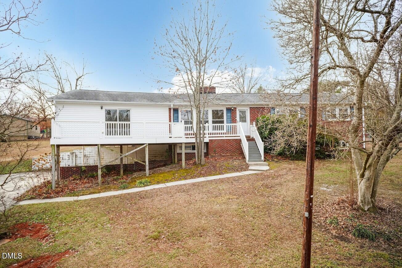 4000 Donna Road Raleigh, NC 27604 - Photo 4 of 58 a view of a house with a backyard
