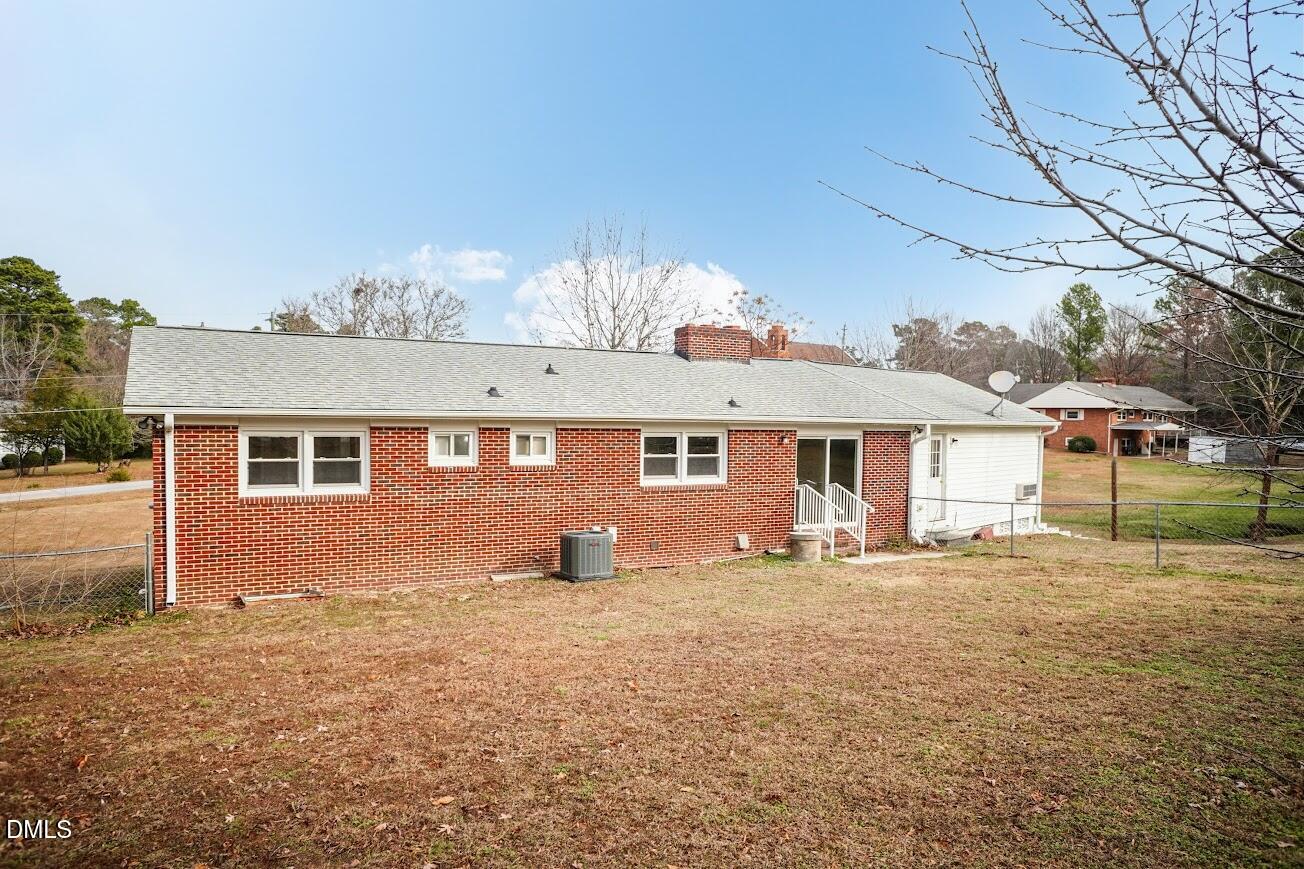 4000 Donna Road Raleigh, NC 27604 - Photo 52 of 58 a front view of a house with a yard