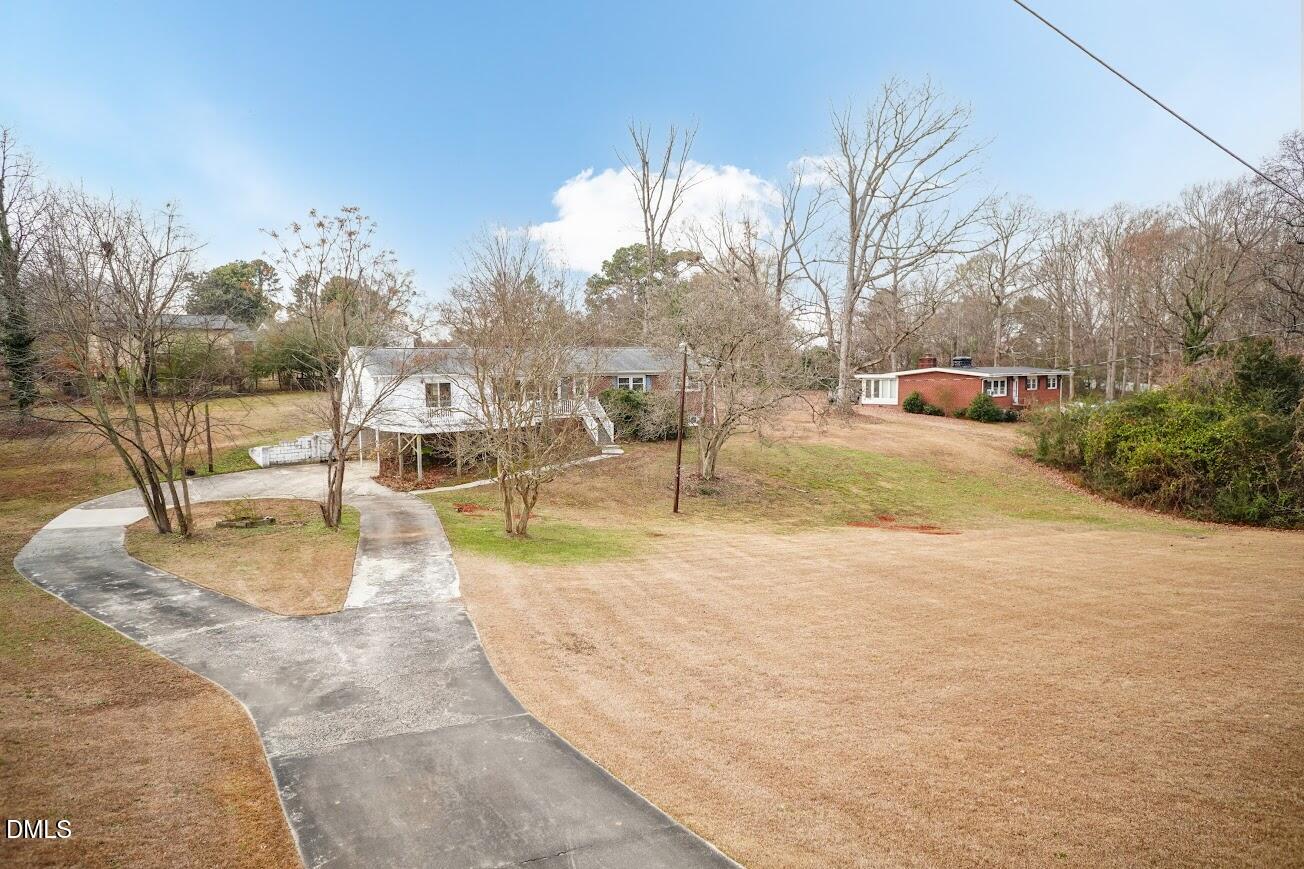 4000 Donna Road Raleigh, NC 27604 - Photo 8 of 58 a view of a swimming pool with a patio