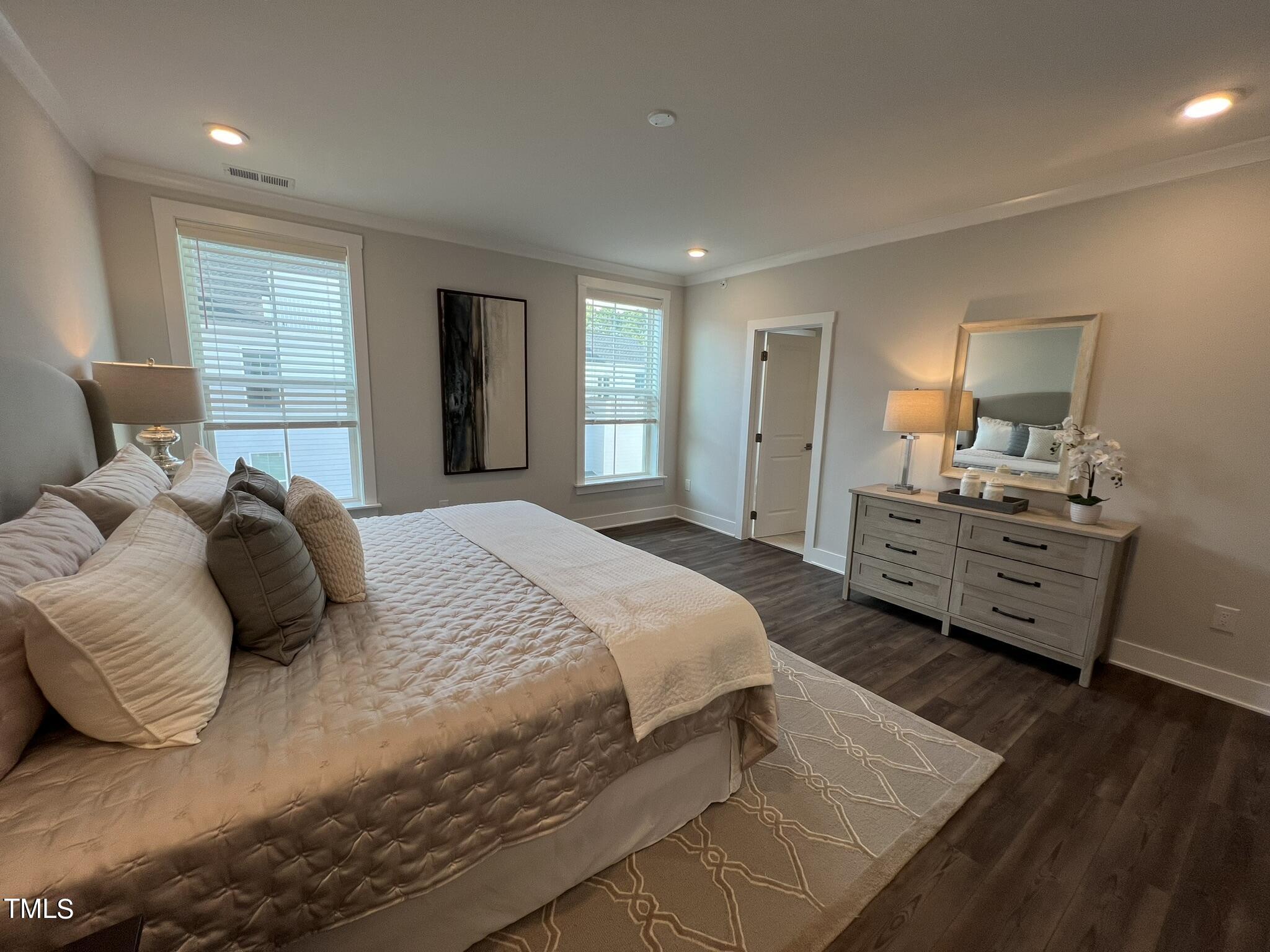 11549 Helmond Way, Unit 102 Raleigh, NC 27617 - Photo 28 of 52 Primary Bedroom from Closet
