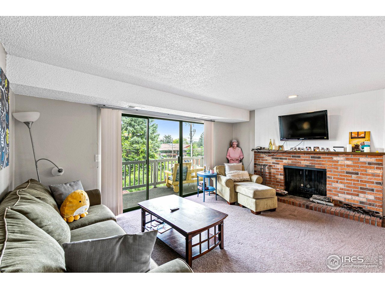 2141 Baseline Road, Unit 17 Boulder, CO 80302 - Photo 2 of 24 Living Room w/ Fireplace