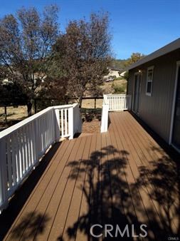 19111 Stonegate Road Hidden Valley Lake, CA 95467 - Photo 13 of 15 a view of balcony with wooden floor and fence